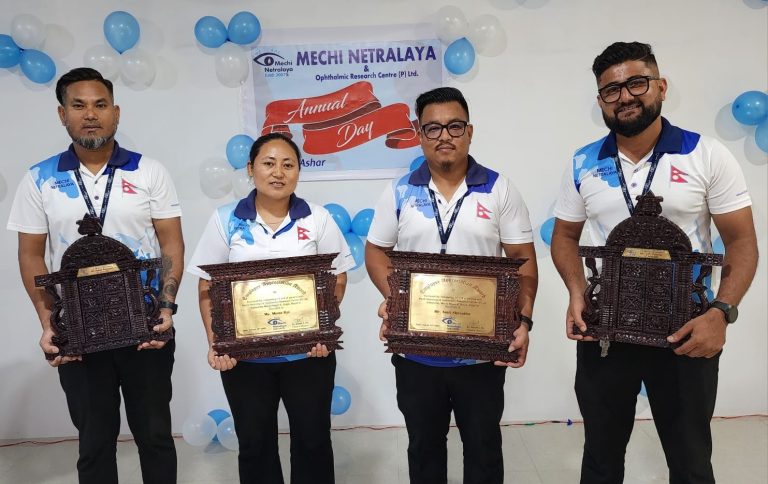 Four employees of Mechi Netralaya holding awards on annual day