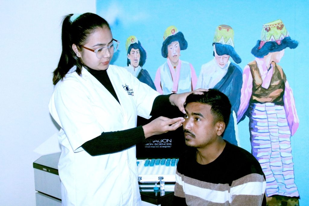Eye examination by a female optometrist at Mechi Netralaya