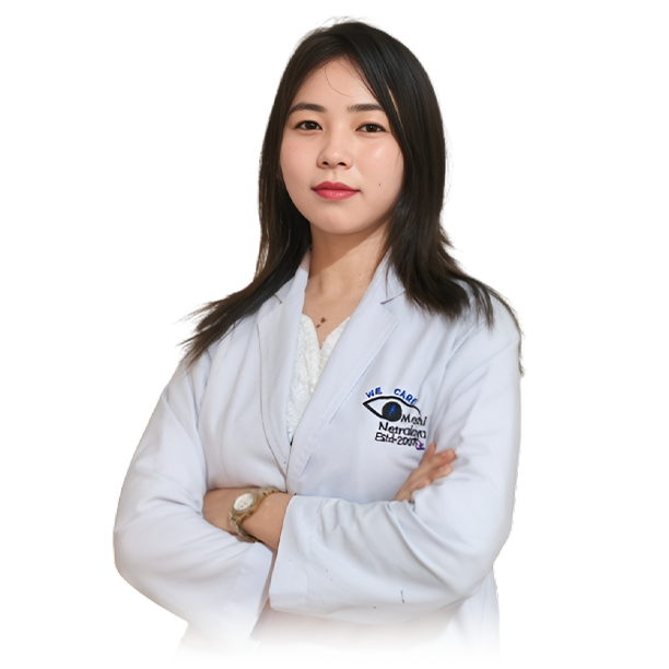 Portrait of a woman in a white lab coat with arms crossed